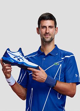 Novak holding Court FF Novak Tennis Shoes