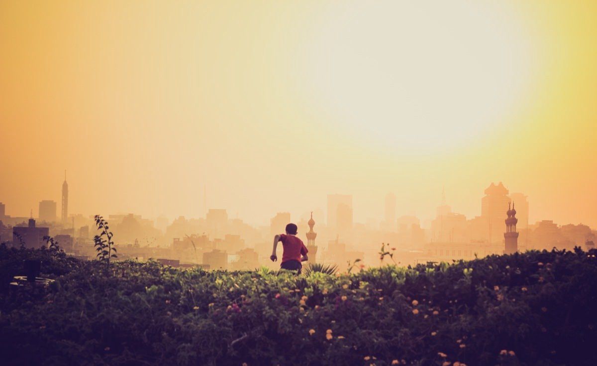 running through summer field