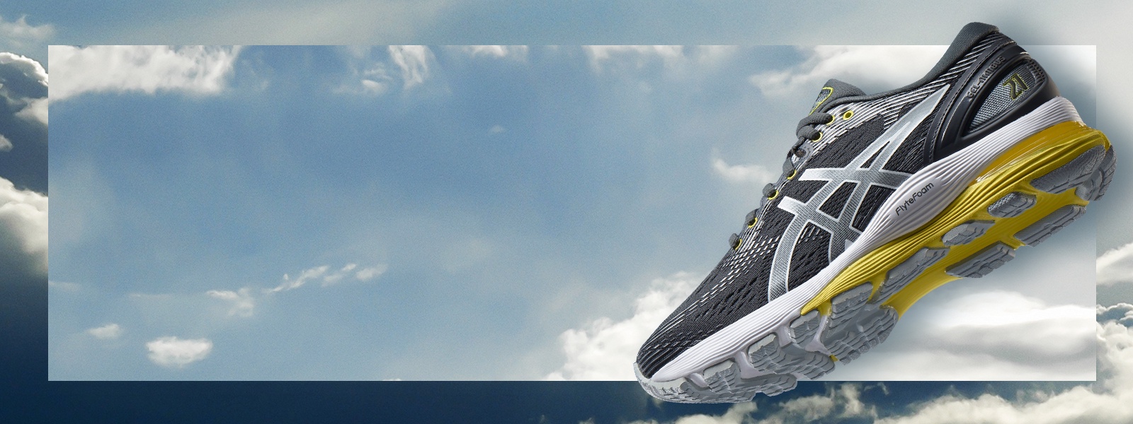 Grey and yellow shoe floating in clouds