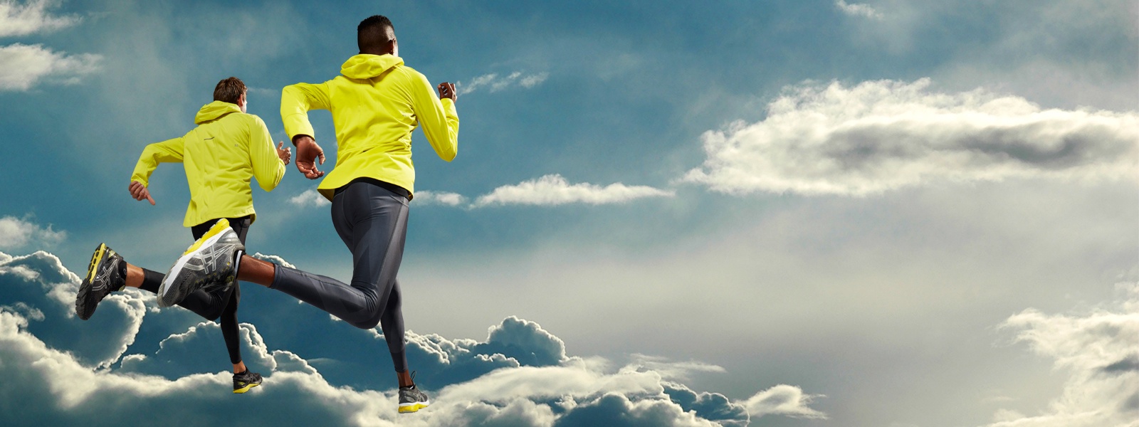Man and woman in running gear running on clouds.
