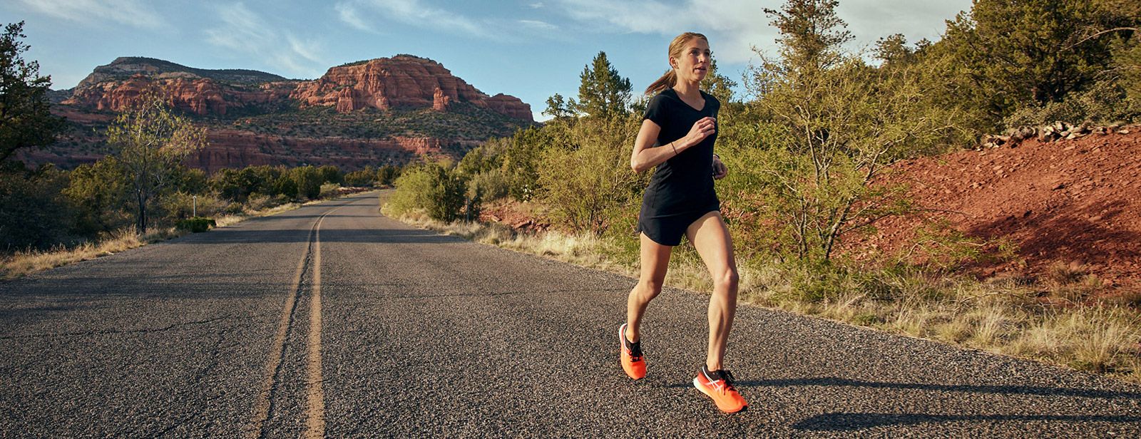 ASICS athlete Sara Hall running in Arizona desert.