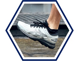 Closeup of a gray running shoe.