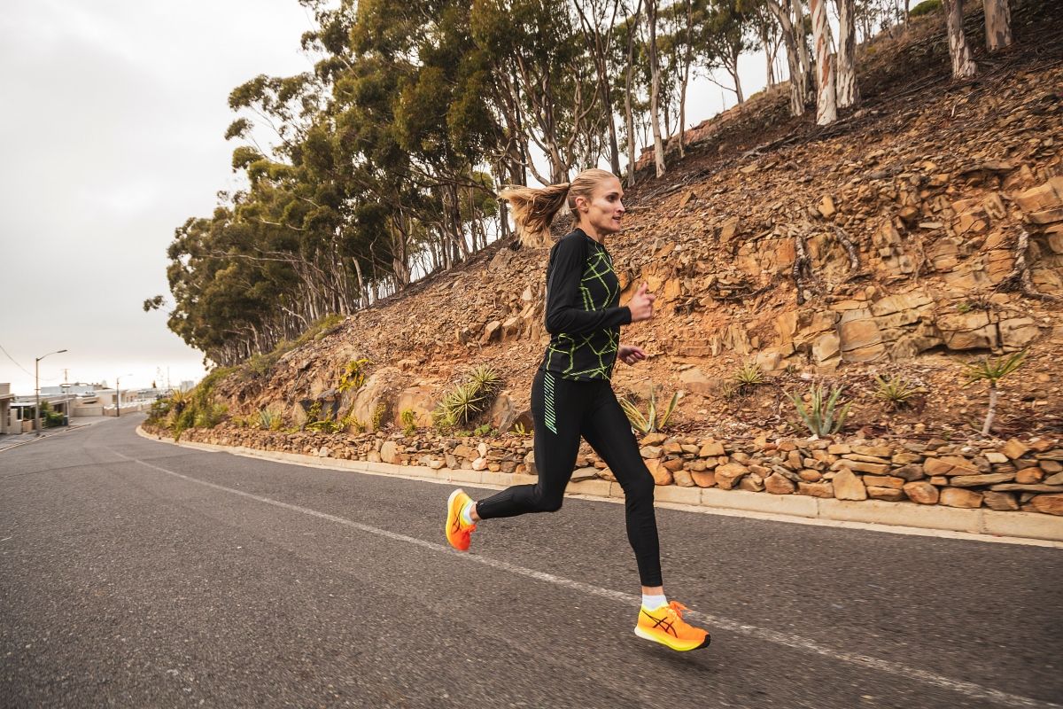 Irvette van Zyl running in ASICS 