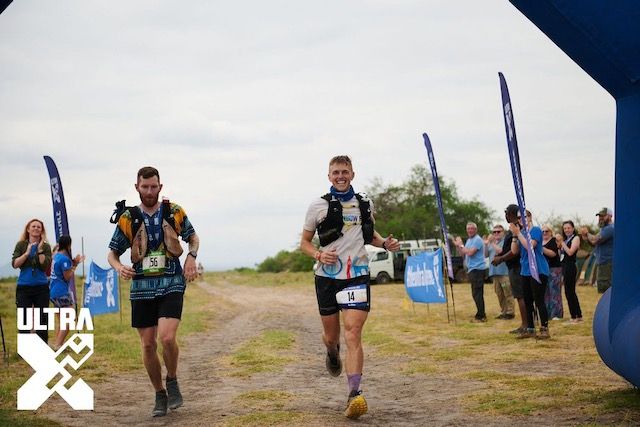 Dan crossing the finish line after 250KM